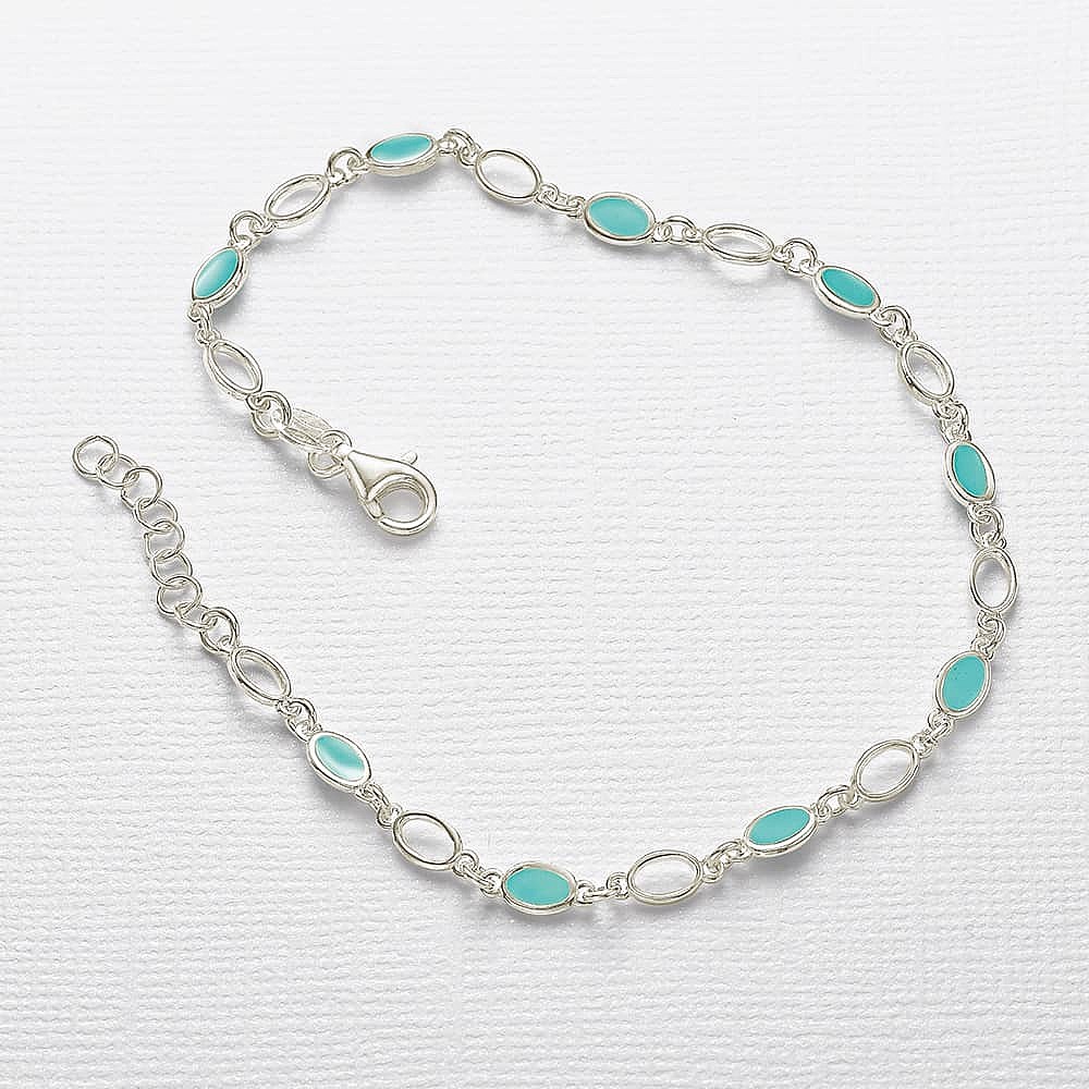 Sterling silver bracelet with blue stones sales